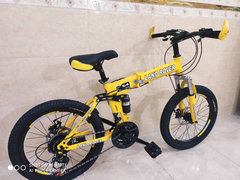 دوچرخه تاشو سایز ۲۰  LAND ROVER  رنگ‌ زرد   دنده شیمانو