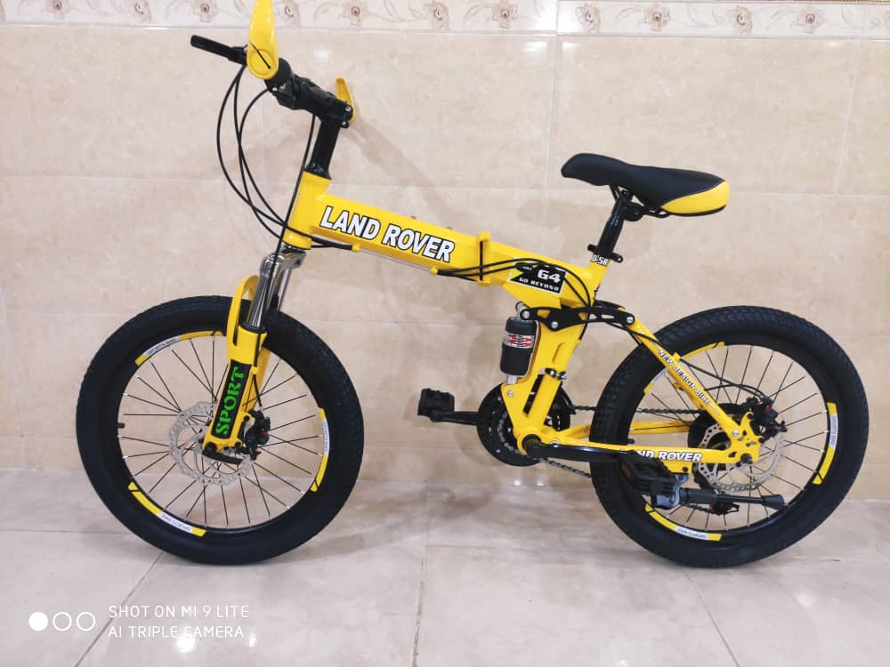 دوچرخه تاشو سایز ۲۰  LAND ROVER  رنگ‌ زرد   دنده شیمانو