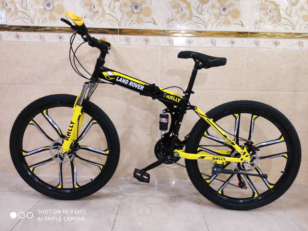 دوچرخه تاشو سایز ۲۶ ، ۲۴ و‌۲۷  LAND ROVER  رینگ ۱۰ پره  رنگ زرد