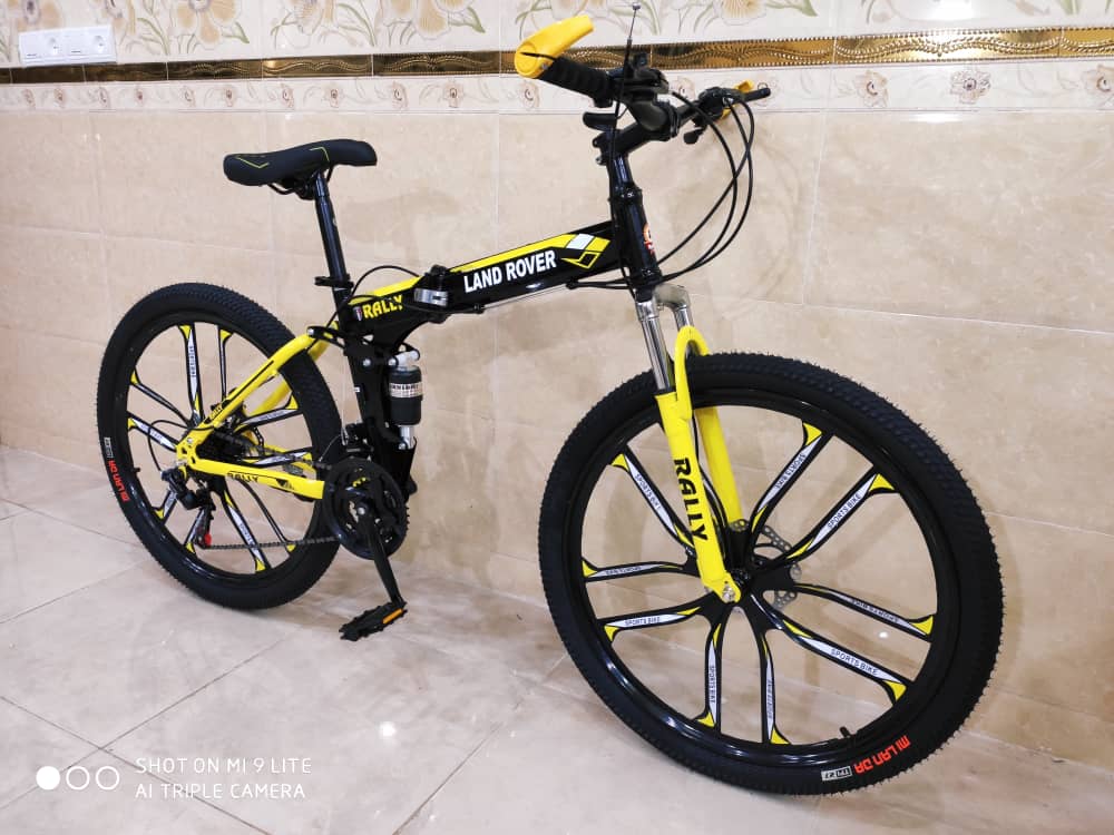 دوچرخه تاشو سایز ۲۶ ، ۲۴ و‌۲۷  LAND ROVER  رینگ ۱۰ پره  رنگ زرد