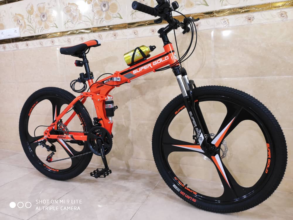 دوچرخه تاشو سایز ۲۶ ،۲۴ و ۲۷ SUPER GOLD سوپر گلد ، رینگ‌ سه پره رنگ‌ نارنجی همراه با هدیه