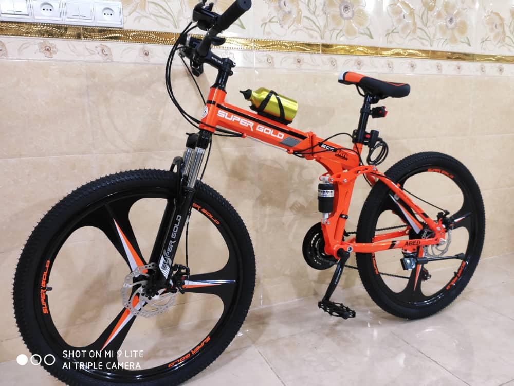 دوچرخه تاشو سایز ۲۶ ،۲۴ و ۲۷ SUPER GOLD سوپر گلد ، رینگ‌ سه پره رنگ‌ نارنجی همراه با هدیه