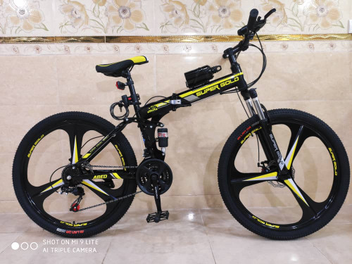دوچرخه تاشو سایز ۲۶ ،۲۴ و ۲۷  SUPER GOLD سوپر گلد ، رینگ‌ سه پره رنگ‌ مشکی همراه با هدیه