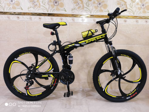 دوچرخه تاشو سایز ۲۶، ۲۴ و ۲۷   SUPER GOLD سوپر گلد ، رینگ‌ شش پره رنگ‌ مشکی همراه با هدیه