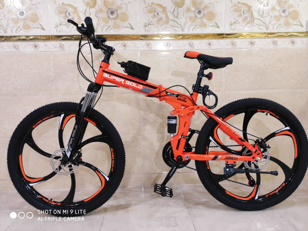 دوچرخه تاشو سایز ۲۶ ،۲۴ و ۲۷  SUPER GOLD سوپر گلد ، رینگ‌ شش پره رنگ‌ نارنجی  همراه با هدیه