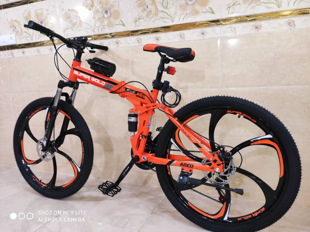 دوچرخه تاشو سایز ۲۶ ،۲۴ و ۲۷  SUPER GOLD سوپر گلد ، رینگ‌ شش پره رنگ‌ نارنجی  همراه با هدیه